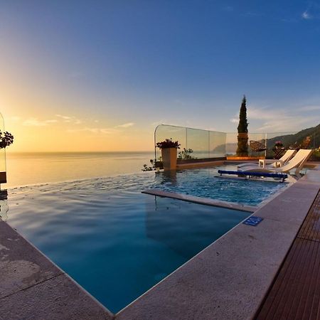 Casa Tramonto Beach View อากิออส กอร์ดิออส ภายนอก รูปภาพ
