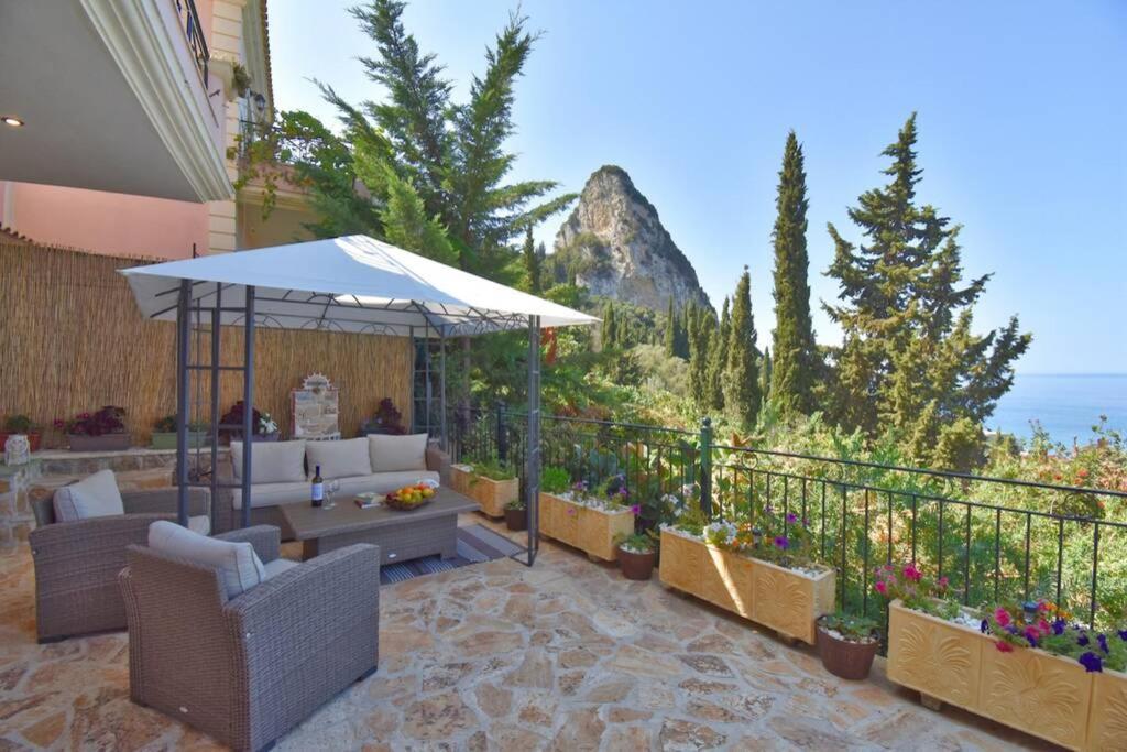 Casa Tramonto Beach View อากิออส กอร์ดิออส ภายนอก รูปภาพ