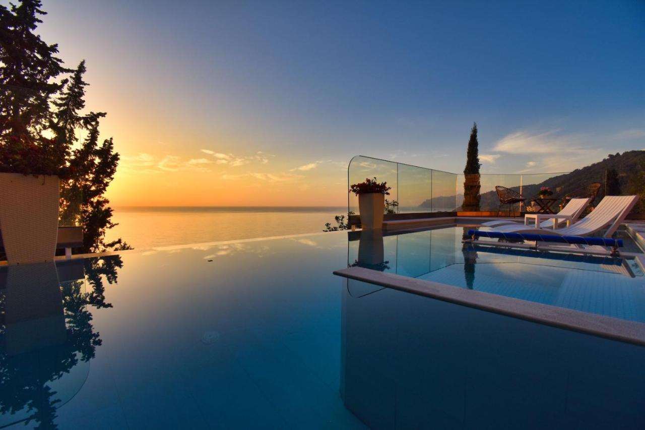 Casa Tramonto Beach View อากิออส กอร์ดิออส ภายนอก รูปภาพ